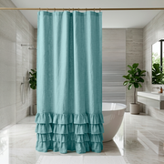 Aquamarine Blue Linen Ruffle Shower Curtain in a Bright Modern Bathroom with Light Stone Walls