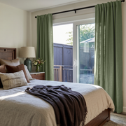 Asparagus Green Linen Back Tab Curtains for Sliding Door in a Cozy Bedroom with Cream Walls, Warm Wood Furniture, and Black Curtain Rod - Cotton Lining
@Heading: Back Tabs