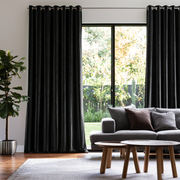 Black Velvet Eyelets Extra Long Curtains in a Modern Living Room with Grey Sofa and Garden View
