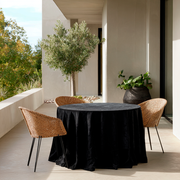 Black Velvet Round Tablecloth in a Covered Patio Dining Setting