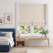 Cream Roman Blinds in a Modern Bedroom with White Walls and a Blue Bed
