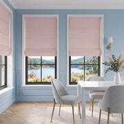 Dusty Pink Roman Blinds in a Contemporary Dining Room with Soft Blue Walls and a White Dining Table