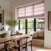 Dusty Pink Linen Roman Blinds in a Contemporary Kitchen with a Light Wood Dining Table - Blackout Lining