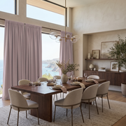 Dusty Pink Linen Rod Pocket Dining Room Curtain in a Modern Coastal Dining Room with Textured Beige Walls and a Walnut Dining Table Featuring Cream Upholstered Chairs - Blackout Lining