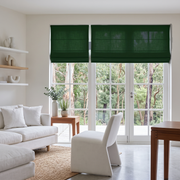 Forest Green Linen Cordless Roman Blinds in a Modern Living Room