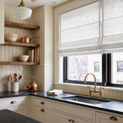 Off-White Heavy Weight Linen Roman Blinds in a Warm Cottage Kitchen with Beadboard Walls