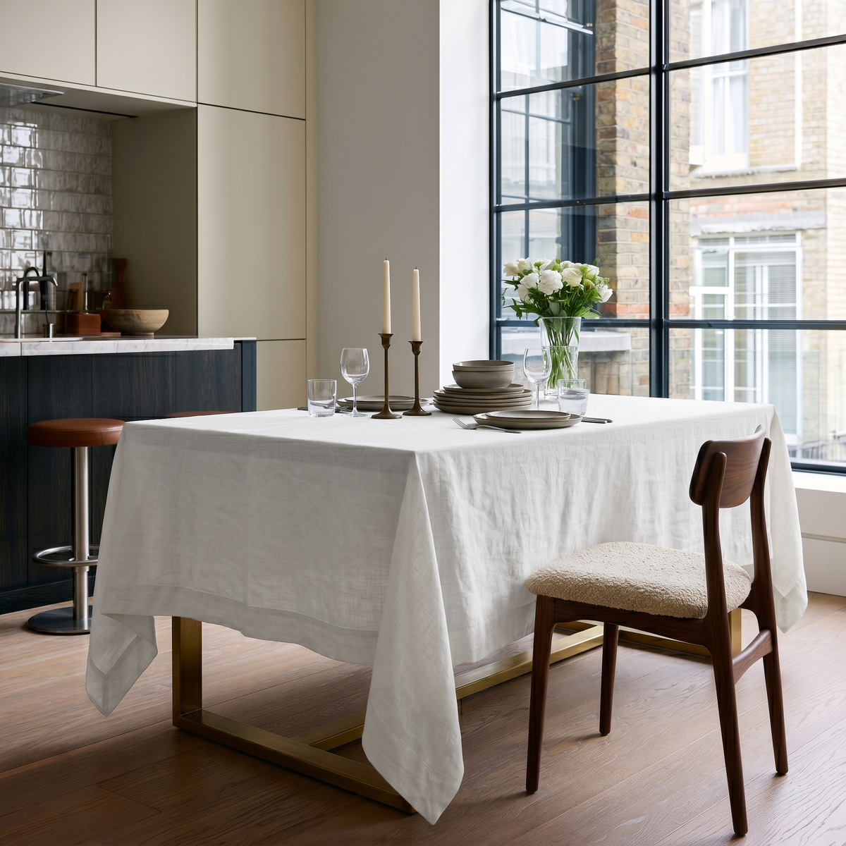 Off-White Rectangular Heavy Weight Linen Tablecloth in a Modern Kitchen with Black-Framed Windows