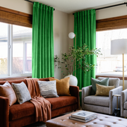 Lime Green Velvet Back Tab Curtains in an Eclectic Living Room with Beige Walls and a Rust Velvet Sofa