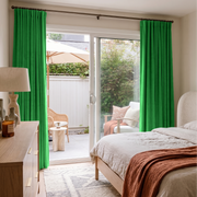 Lime Green Velvet S-Fold Sliding Patio Door Curtains in a Contemporary Bedroom with Light Wood Furniture and Rust Bedding