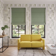 Asparagus Roman Blinds in a Living Room with Patterned Wallpaper and a Yellow Sofa