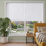 White Linen Cordless Roman Blinds in a Contemporary Bedroom with Sage Green Walls and a Yellow Bed