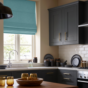 Aquamarine Blue Linen Roman Blinds in a Moody Contemporary Kitchen with Charcoal Cabinetry