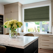 Sage Green Linen Roman Blinds in an Elegant Contemporary Kitchen with a Marble Island - Blackout Lining