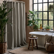 Natural Heavy Weight Linen Button-Hole Top Weighted Shower Curtain in a Sunlit Bathroom