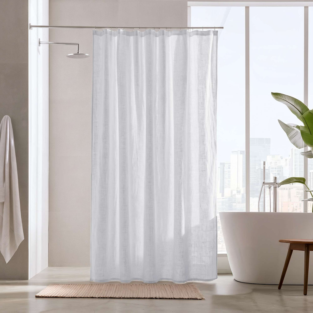 White Linen Button-Hole Top Weighted Shower Curtain in a Bright, Sunlit Modern Bathroom Interior