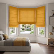 Yellow Roman Blinds in a Dining Room with Sage Green Walls and White Dining Chairs