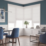 Heavy Off-White Roman Blinds in a Contemporary Dining Room with Slate Blue Walls and Blue Dining Chairs