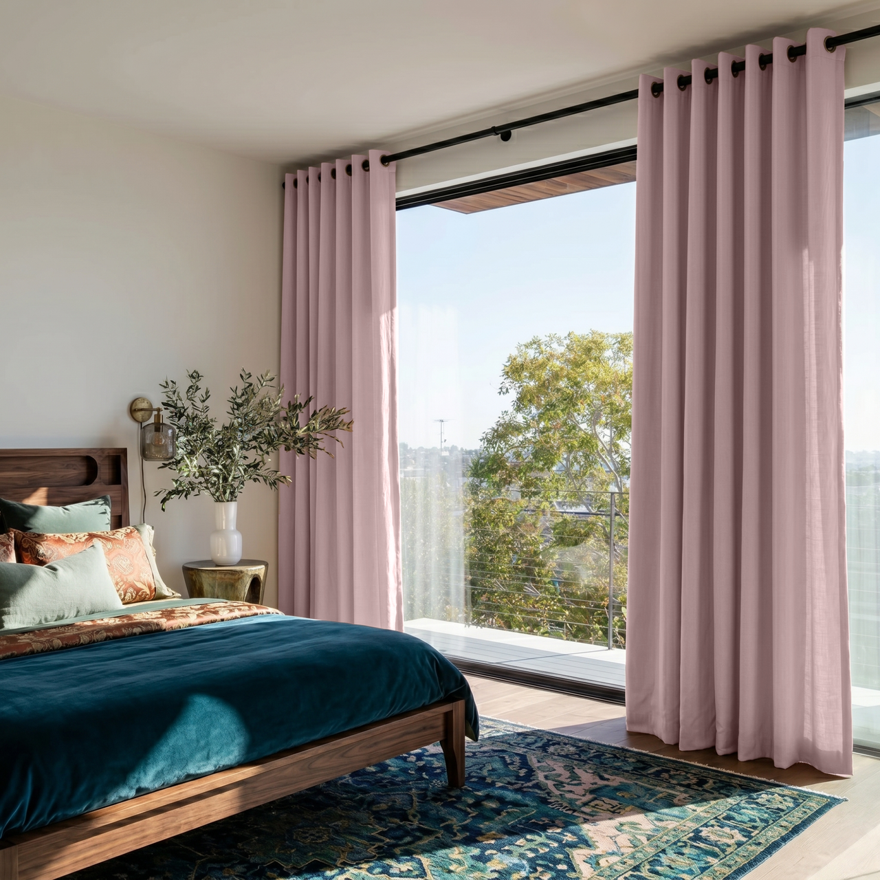 Dusty Pink Linen Eyelet Bedroom Curtains in a Bright Contemporary Bedroom with Deep Teal Bedding and Patterned Accent Pillows