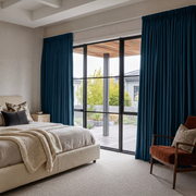 Peacock Blue Linen Pencil Pleat Curtains in a Modern Bedroom - Blackout Lining