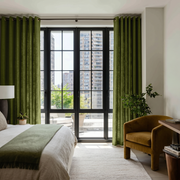 Moss Green Linen Eyelet Bedroom Curtains in a Contemporary Bedroom with  a Mustard Yellow Chair - Cotton Lining