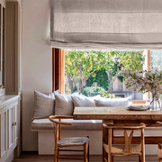 Natural Linen Roman Blinds in a Sunlit Breakfast Nook Kitchen with Warm Wood Dining Furniture - Cotton Lining