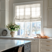 Off-White Linen Kitchen Roman Blinds in an Elegant Kitchen with White Cabinetry - Blackout Lining