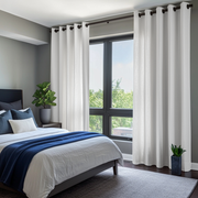 Off-White Linen Grommet Bedroom Curtains in a Contemporary Bedroom with Cool Grey Walls and Navy Blue Bedding