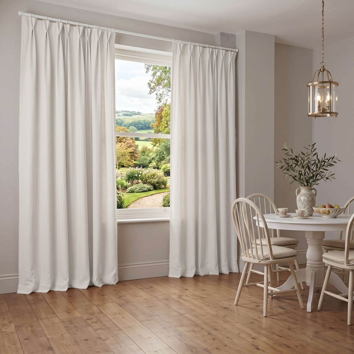 Off-White Linen Pinch Pleat Curtains In A Traditional Dining Room With Light Gray Walls And Wide Plank Hardwood Flooring Next To A White Vintage Dining Set - Blackout Lining