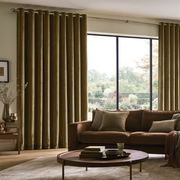 Olive Brown Velvet Eyelets Extra Long Curtains in a Contemporary Living Room with Brown Sofa and Round Coffee Table