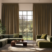 Olive Brown Velvet Pencil Pleat Extra Long Curtains in a Modern Living Room with Two Green Sofas, a textured rug and a low wooden coffee table