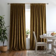 Cozy dining room with chocolate brown rod-pocket curtains, white furniture, and natural greenery