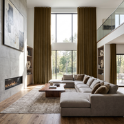 Olive Brown Velvet S-Fold Extra Long Curtains in a Modern Double-Height Living Room with Fireplace and Large Sectional Sofa