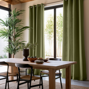 Olive Green Eyelets Curtains Hanging On A Window In A Modern Dining Room