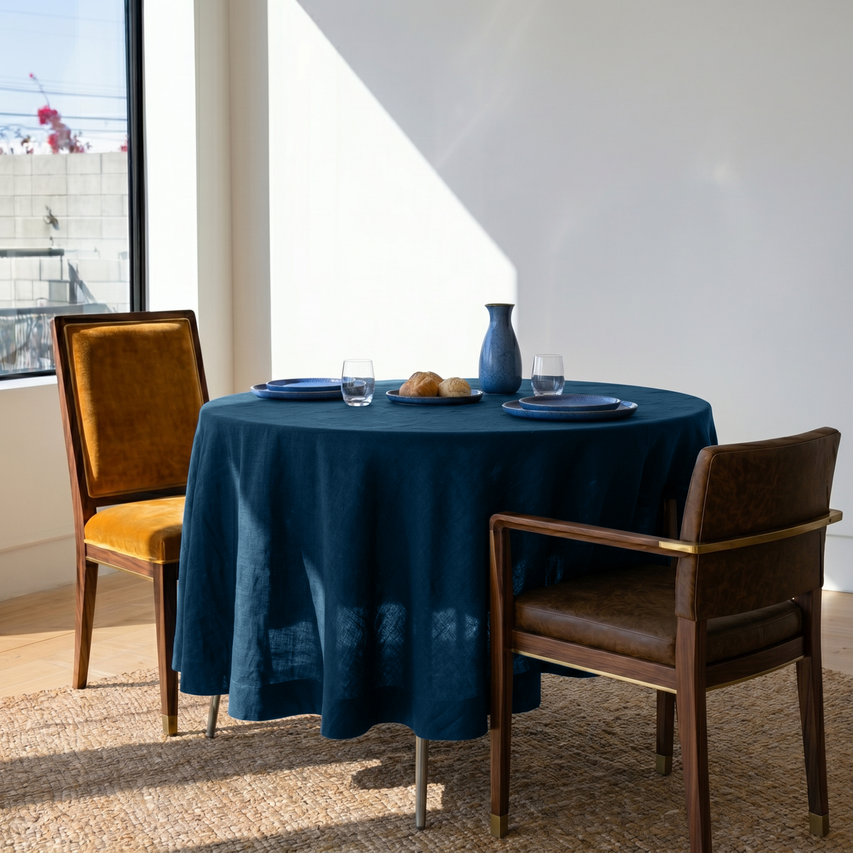 Peacock Blue Linen Round Tablecloth in a Sunlit Dining Nook with White Walls