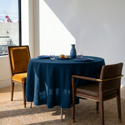 Peacock Blue Linen Round Tablecloth in a Sunlit Dining Nook with White Walls