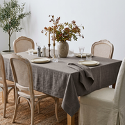 Natural Rectangular Heavy Weight Linen Tablecloth in a French Country Dining Room with Cane Chairs and a Jute Rug