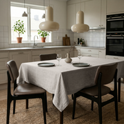 Natural Rectangular Linen Tablecloth in a Scandinavian Kitchen with Neutral Cabinetry