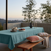 Aquamarine Blue Rectangular Linen Tablecloth on a Modern Outdoor Terrace with Wooden Bench