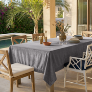 Grey Rectangular Velvet Tablecloth in a Mediterranean Patio Dining Area with Wooden Chairs