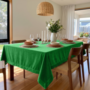 Lime Green Rectangular Velvet Tablecloth in a Modern Dining Room with Cane Chairs