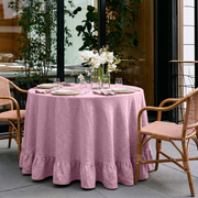 Dusty Rose Linen Round Ruffle Tablecloth in an Outdoor Patio Dining Space