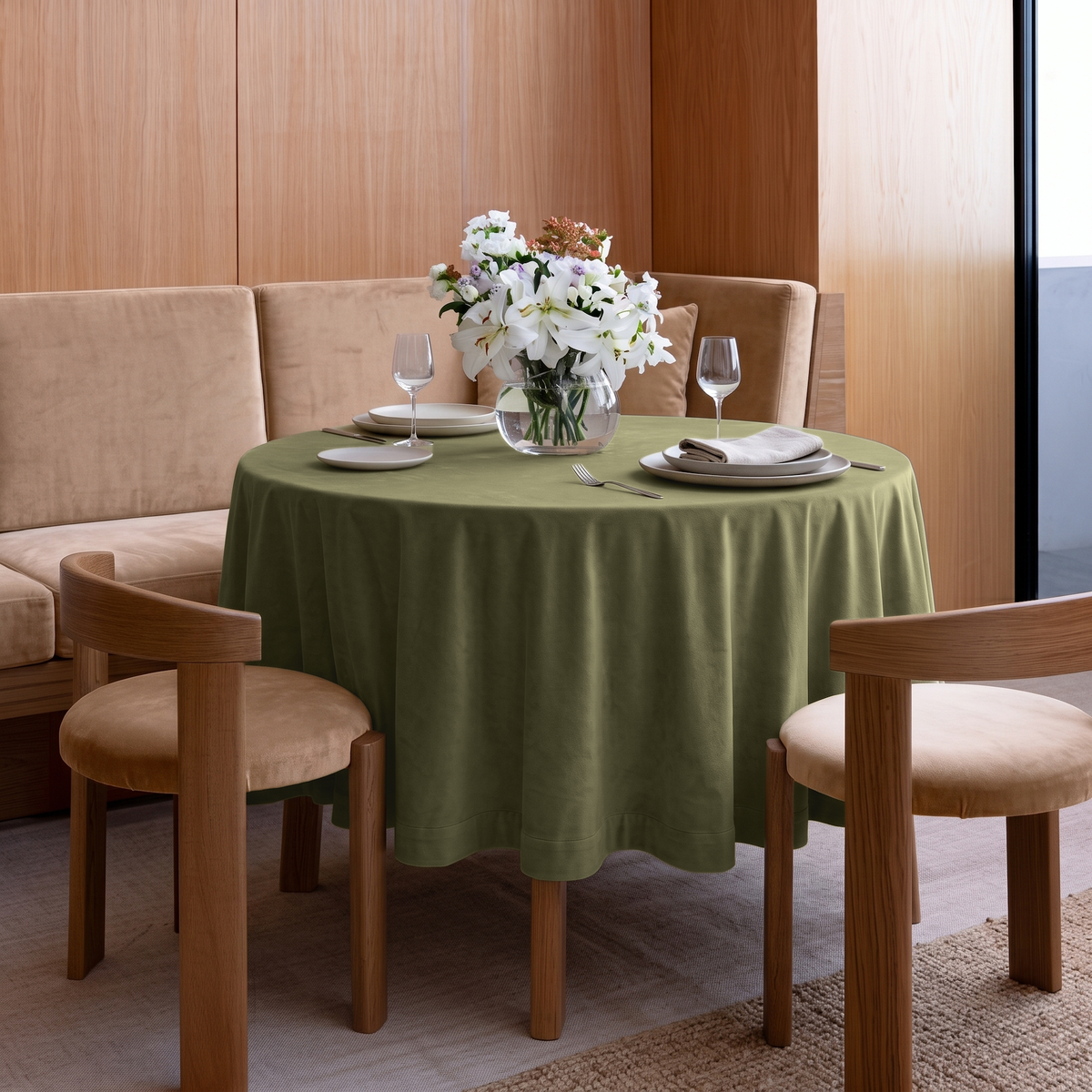 Olive Green Round Velvet Tablecloth in a Contemporary Dining Nook with Wood Paneling and Beige Seating