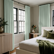 Mint Green Velvet S-Fold Curtains in a Modern Bedroom with White Bedding and Olive Green Accents