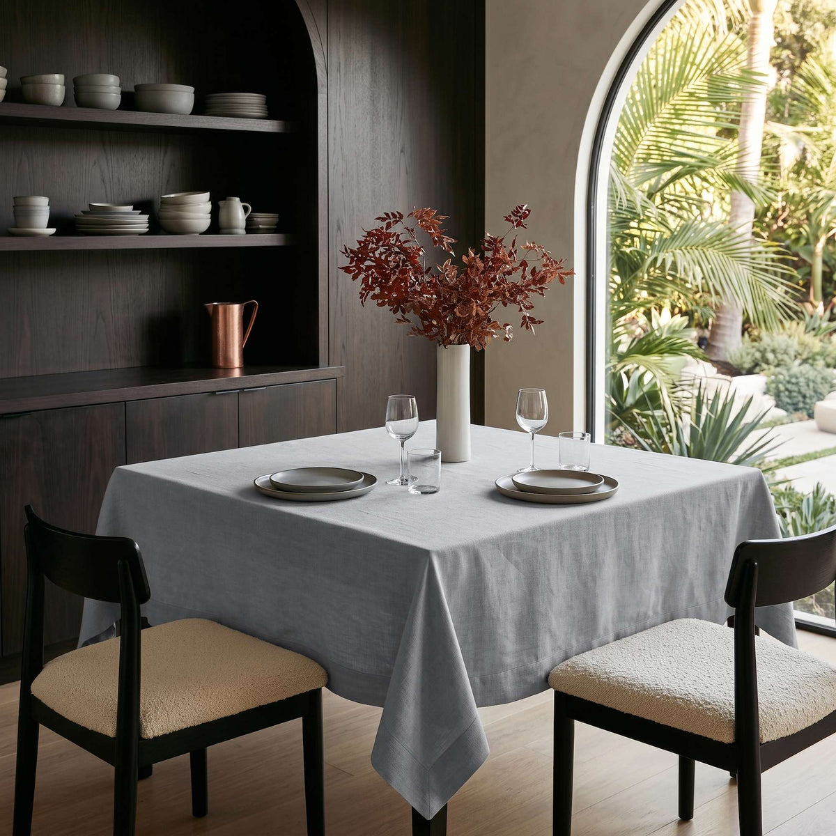 Stone Grey Square Linen Tablecloth in a Contemporary Dining Room with Dark Wood Cabinetry