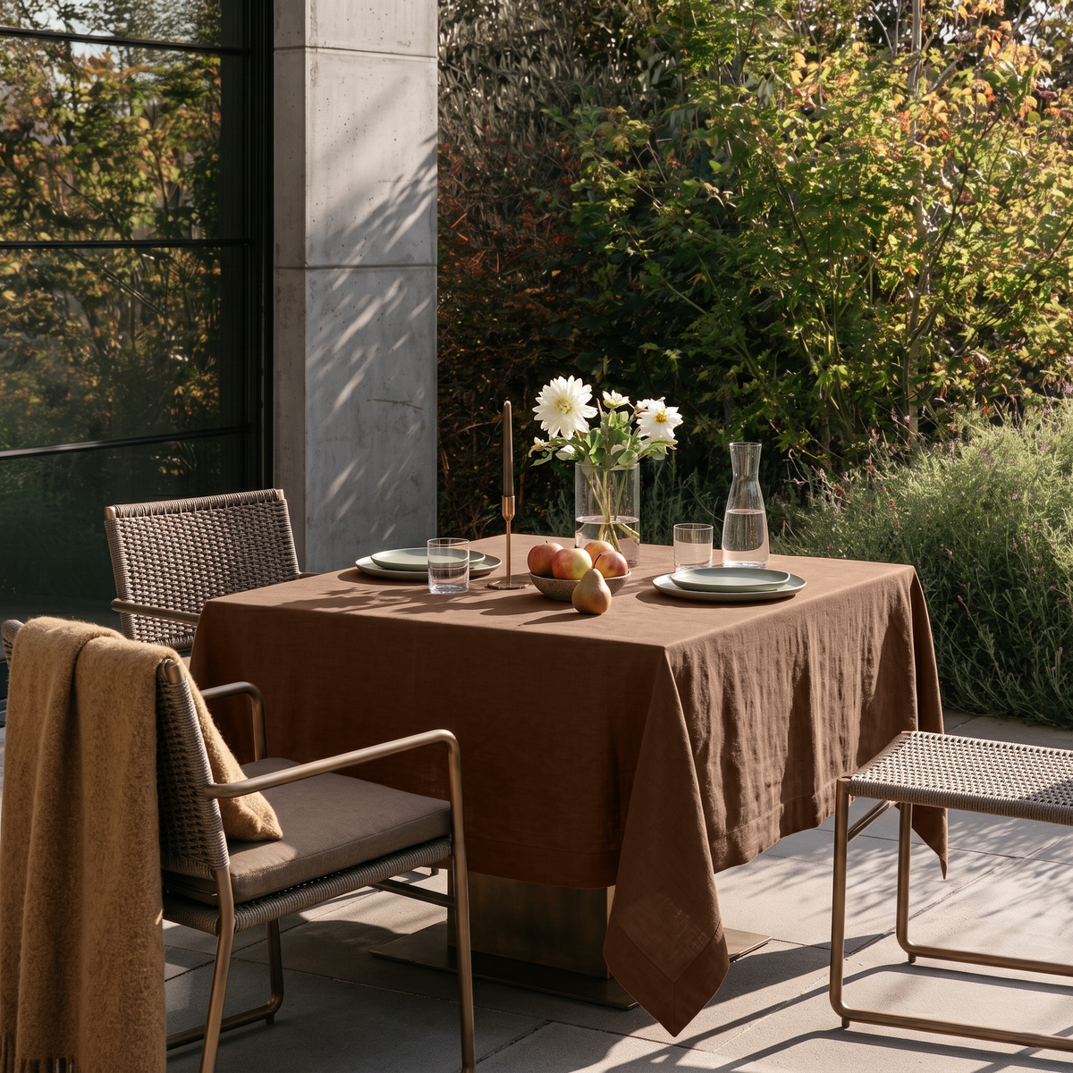 Tawny Brown Square Linen Tablecloth on a Contemporary Garden Patio with Woven Chairs