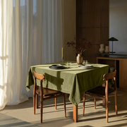 Moss Green Square Velvet Tablecloth in a Mid-Century Modern Dining Room with Walnut Furniture and Sheer Curtains