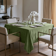 Sage Green Square Velvet Tablecloth in a Transitional Dining Room with Brass-Framed Armchairs