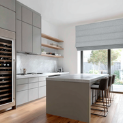 Stone Grey Linen Roman Blinds in a Minimal Kitchen with Grey Cabinetry - Blackout Lining