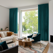 Teal Velvet Rod Pocket Blackout Curtains in a Living Room with White Walls