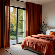 Terracotta Heavy Weight Linen Back Tab Curtains for Sliding Door in a Warm Bedroom with Black-Framed Doors, Beige Walls, and Garden View - Blackout Lining
@Heading: Back Tabs
